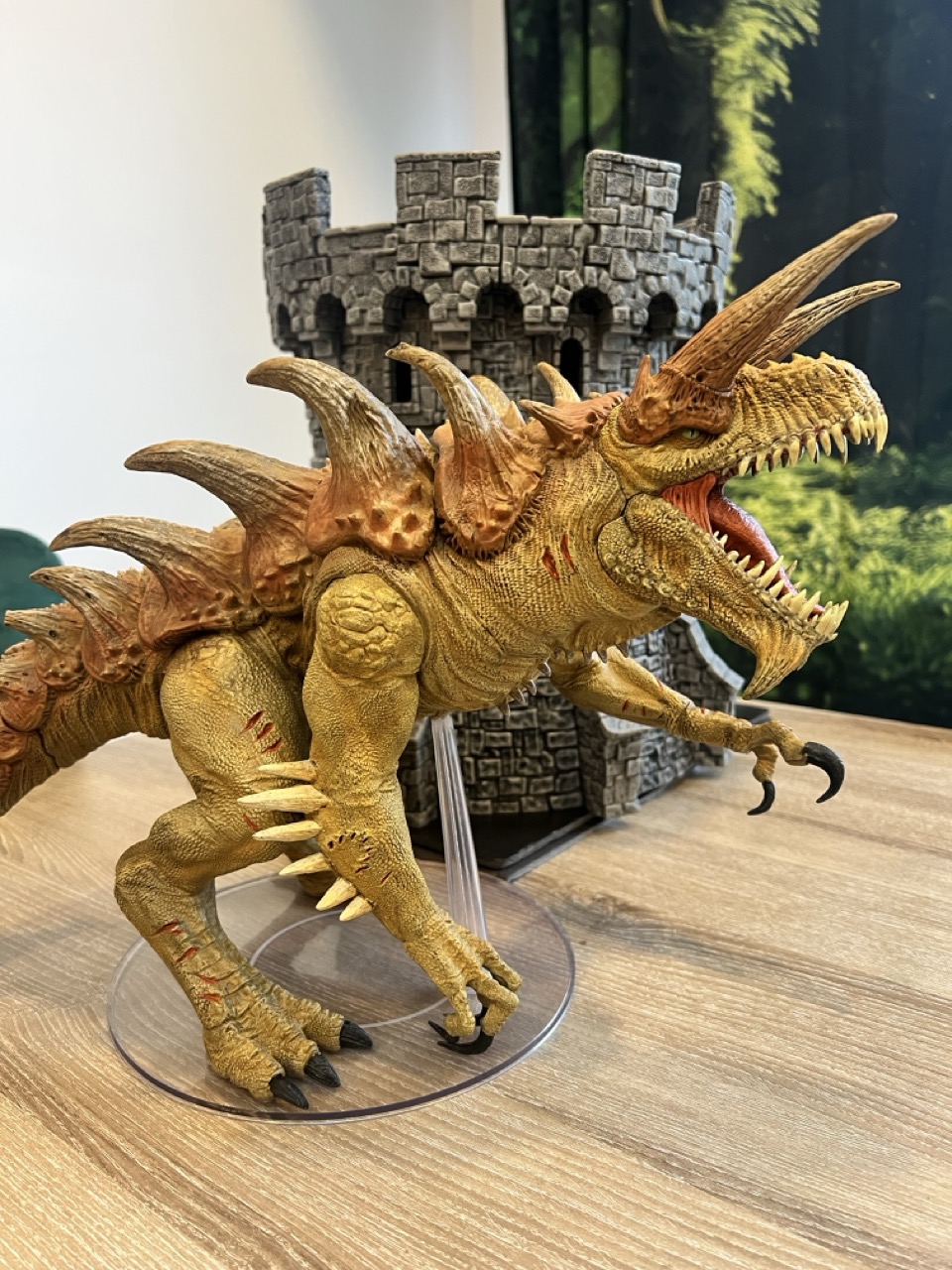 A group of kids point to a the game figures in front of them while playing Dungeons & Dragons.